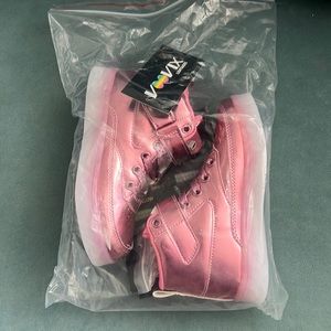 Pink light up shoes in a kids size 30 (12.5) new with plug and tags.